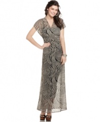 Soft chiffon meets a bold zebra print on a maxi dress that can't be tamed! From Ali & Kris.