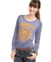 Go sporty-chic in this Planet Gold varsity baseball tee. Perfect for winning casual style!