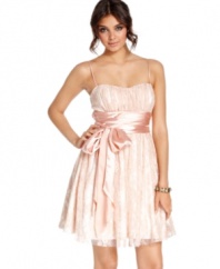 Overlaid in girlish lace and adorned with a sweet satin sash, this dress from B Darlin caters to your femme party style.