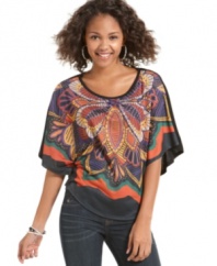 A tribal print is the abstract centerpiece of this floaty top from Living Doll! Pair it with denim and colorful flats for an on-trend look that sings free-spirit!