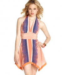 A lively print adds maximum color to this sweet yet vixenish halter dress from GUESS? -- a  hot style for blazing days!