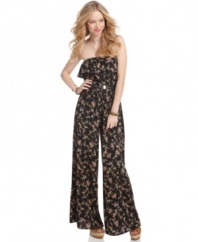Score vintage-inspired style with this floral-print jumpsuit from American Rag! Pairs great with platform heels for a look that's utterly chic!
