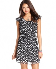 It's raining hearts! Girlish print and tiered flutter sleeves make this dress from BeBop a style you're sure to love.