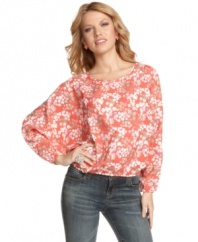 Give your favorite skinny jeans a graphic boost with this pretty abstract print top from Jessica Simpson!