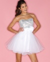 Don femme and flirty style with this dress from B Darlin that features a sequined bodice and a tulle-licious super skirt!