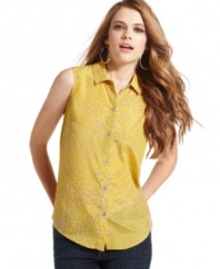 Cute top alert! Classic button-down style meets bright print and cutout design on this summer-ready top from Jessica Simpson.
