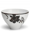 Like a well-manicured flowerbed, the Cocoa Blossom large rice bowl brings just the right balance of whimsy and sophistication to the table. Rich hues of chocolate and cinnamon color the lush blooms against elegant white porcelain.