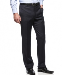 A timeless American standard. These good-looking navy pants from Tommy Hilfiger offer an updated trim fit.