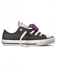 Old-school style. She'll appreciate the history behind these fantastic Chuck Taylor shoes from Converse.