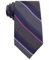 In a traditional stripe pattern, this Calvin Klein tie recalls classic haberdashery style.