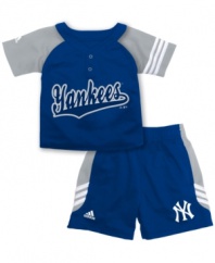 Play like the pros. He can suit up like his favorite MLB star for backyard baseball in this jersey and shorts set from adidas.