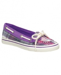 Top-deck style. She can pump up her preppy fashion with these sequin boat shoes from Sperry.