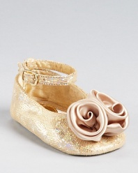 Perfect for your little princess, this dreamy ballet flat shines with a metallic upper and large rosette at the toe.