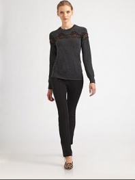 Refined and ultra-soft wool is embellished with lace cut-outs.CrewneckLong sleevesPullover styleVirgin woolDry cleanMade in Italy of imported fabric Model shown is 5'10 wearing US size 4. 