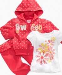Her style will be on point. Polka dots and flowers add pop to this comfortable hoodie, shirt and pant set from Nannette.