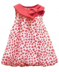 Make her look as bubbly as she feels with this darling sundress from Baby Essentials.