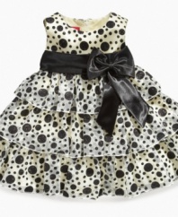 She'll perk up any party when she makes a grand entrance in this sparkly polka-dot dress from Princess Faith.