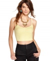 A little bit sexy and a little bit sweet, wear this eyelet Free People cropped bustier alone or layered under a sheer top!