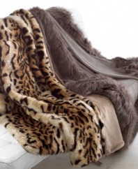 Warm and fuzzy. With style and function, these Luxury Faux Fur throws are perfect for your living space, featuring ultra-soft texture to wrap you in warmth and chic tiger and dove faux fur.