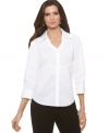 Alfani creates a flattering look on the classic button front shirt with a ribbed waist. So versatile you'll want to wear it with skirts, pants and even jeans!