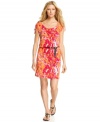 A bright abstract print makes a bold splash on this MICHAEL Michael Kors dress for standout spring style!
