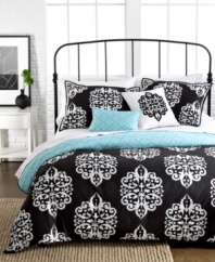 Simply striking. The Sunset and Vines Dalton comforter set brings decidedly modern style to the bedroom with a smart black and white medallion pattern. Reverses to a subtle design in a soft blue tone for a refreshing option.