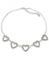 Let your heart shine with this GUESS collar necklace flaunting five heart pendants embellished with crystal accents. Crafted in silver tone mixed metal. Approximate length: 16 inches + 2-inch extender.