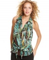 A tropical, rainforest-inspired print provides perfectly earthy style to this tie-front button down top from XOXO!