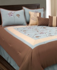 Floral arrangement. A beautiful light blue center panel is adorned with flowing flowers and surrounded by frames of warm tan and brown hues in this Belle Marine comforter set. Shams, bedskirt and three decorative pillows draw in coordinating hues and floral motifs.