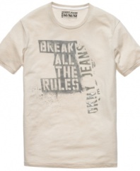 You make 'em, so you can break 'em. Rule casual style with this graphic t-shirt from DKNY.