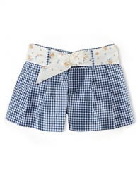 An essential warm-weather short in crisp cotton gingham features finished cuffs and front pleating for a tailored look.