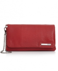 You won't ever want to leave home without this slim silhouette from Kenneth Cole Reaction. Convenient wristlet strap offers perfect portability, while separate zip compartments, card slots and ID window organize your essentials with ease.