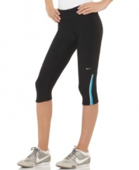 Sporty style and high performance technology come together in these capri active pants from Nike.