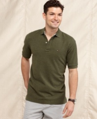 This polo shirt from Tommy Hilfiger is a solid addition to your polished summer look.