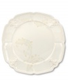 With embossed lilies and golden leaves, Portmeirion's decorated Fleur de Lys salad plate sets tables in the French tradition. Squared, scalloped stoneware in warm ivory lends distinct old-world elegance to everyday dining.