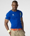 A sporty cotton jersey tee is adorned with vibrant race-inspired graphics for a modern, athletic look.