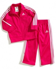 Actively start her sporty style with this athletic tricot jacket and pant set from adidas.
