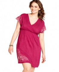 Embroidery really pops against a colorful background, like American Rag's plus size dress! Pair with an armful of bangles to complete the look. (Clearance)