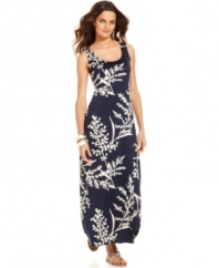 A beautiful vine print winds around this stunning Sunny Leigh maxi dress, adding a soft, romantic feel to its classic silhouette. Flat sandals make it a go-anywhere affair, while dramatic heels dress it up for date night.