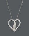 Celebrate your love in style with this elegant heart pendant by Wrapped in Love(tm). Crafted in 14k white gold, open heart-shaped necklace features sparkling round-cut diamonds (1/2 ct. t.w.). Approximate length: 18 inches. Approximate drop: 7/8 inch.