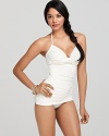 Searing poolside style takes form in this Carmen Marc Valvo swimdress, exuding retro glamour and pure class.