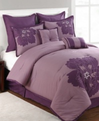 Modern romance blooms. Passionate purple sets the scene in this Fatima comforter set, featuring bold applique flowers in tonal hues. Comes complete with shams, bedskirt and decorative pillows for a look that's simple yet totally chic.