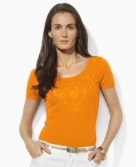 Designed with a chic scoop neckline from light-as-air cotton jersey, Lauren by Ralph Lauren's essential short-sleeved tee is embellished with tonal floral embroidery for a hint of romance.
