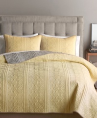 Bryan Keith's Santa Barbara quilt brightens up the bedroom with a beautiful sunny yellow color and allover quilted details in a modern floral motif for style and depth. Reverses to a white-on-gray floral pattern.