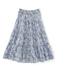 Dainty florals and a smocked waistband give this airy woven cotton maxi skirt a dose of cool boho style.