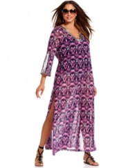 Be the image of beach-chic with INC's plus size cover-up maxi, showcasing a sheer print and sequined accents.