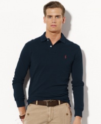 Designed in a relaxed classic fit with looser sleeves, a wider body and a longer hem, this long-sleeved polo shirt is rendered in breathable cotton mesh for handsome style.