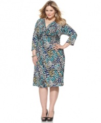 Add a twist to your day-to-play wardrobe with NY Collection's three-quarter sleeve plus size dress, flaunting a knotted front and bold print.