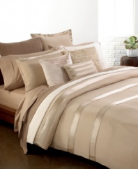 It's all in the details! The Essentials Vapour quilted sham from Donna Karan adds elegance and comfort to your bed with perfectly tailored puckered stitch details.