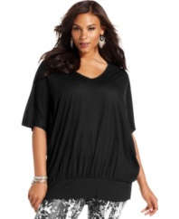 INC's plus size tunic adds a little spice to any outfit, with it's fluid draping and alluring tie-back neckline!